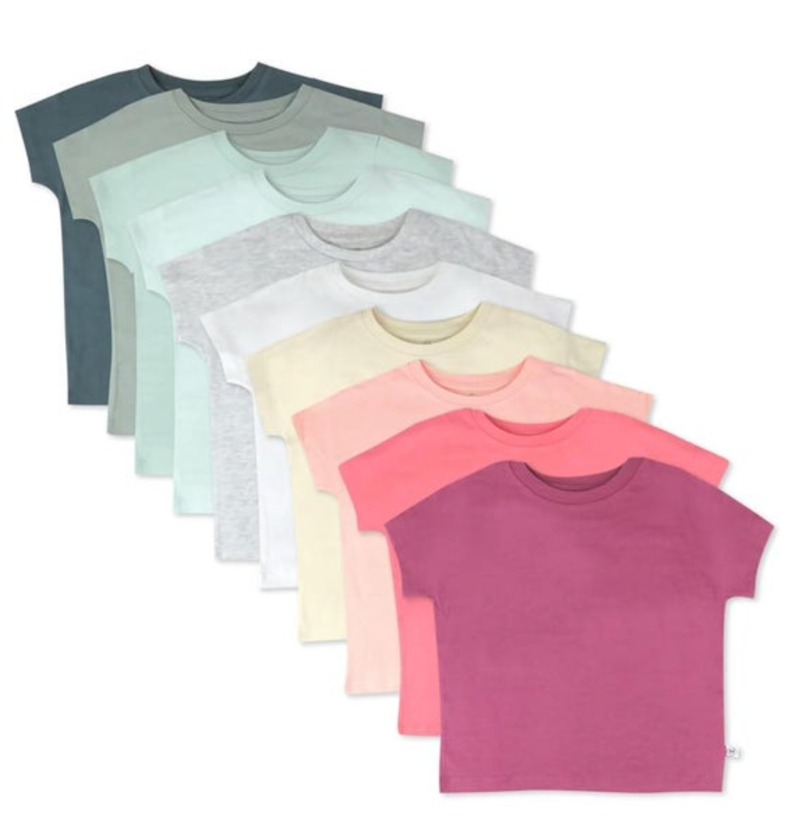 A diagonal display of nine plain short-sleeve t-shirts in a wide pastel and deep color gradient from teal and heather grey to peach and fuchsia pink on a white background