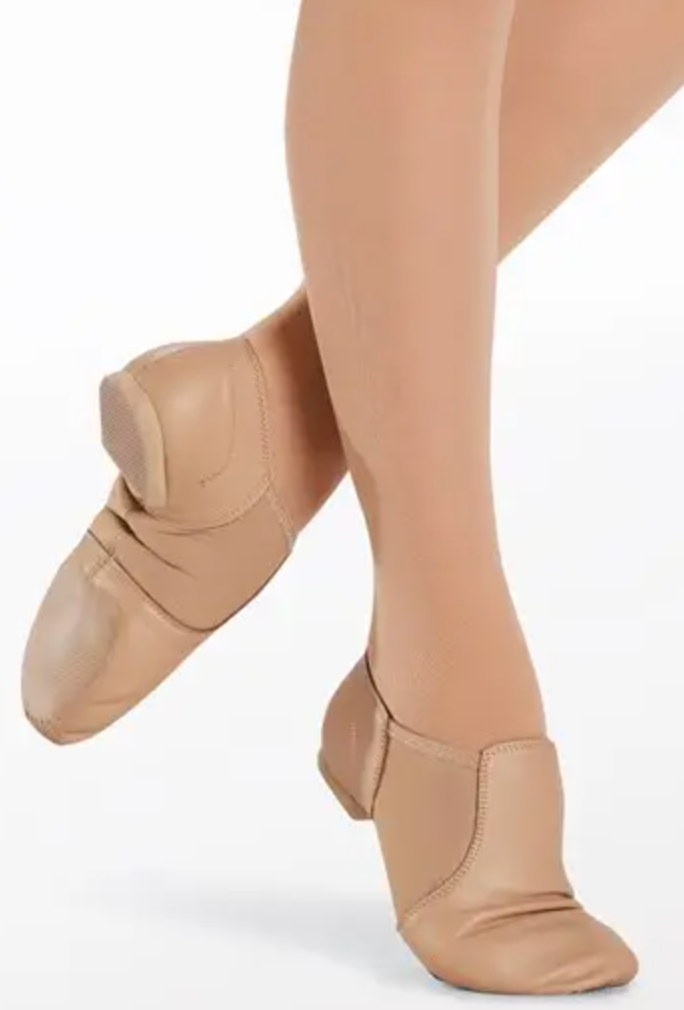 Product photograph of two legs in tan dance tights and matching leather split-sole jazz shoes featuring flexible elastic arches and stitched toe pads on a white studio background
