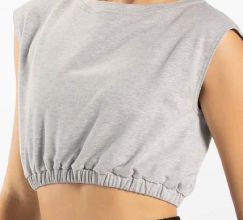 Photograph of a heather gray crop top featuring cap sleeves and an elasticized cropped hem