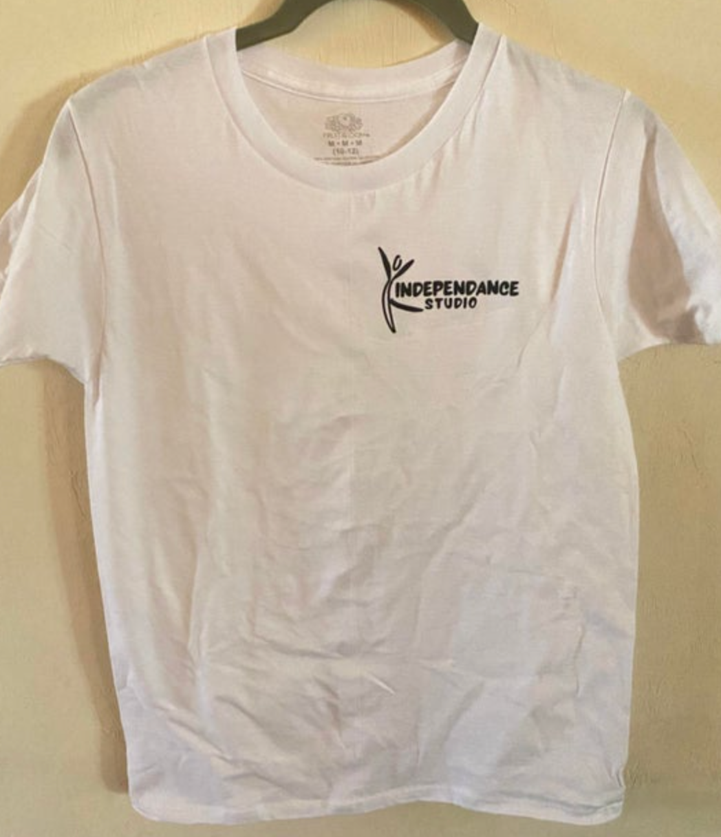 White Fruit of the Loom t-shirt with a black INDEPENDANCE STUDIO logo featuring a stylized dancing figure on the left chest and a visible size tag M-M-M (10-12)