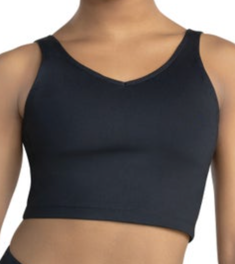A person wears a black seamless V-neck sports bra with wide straps and a cropped hem