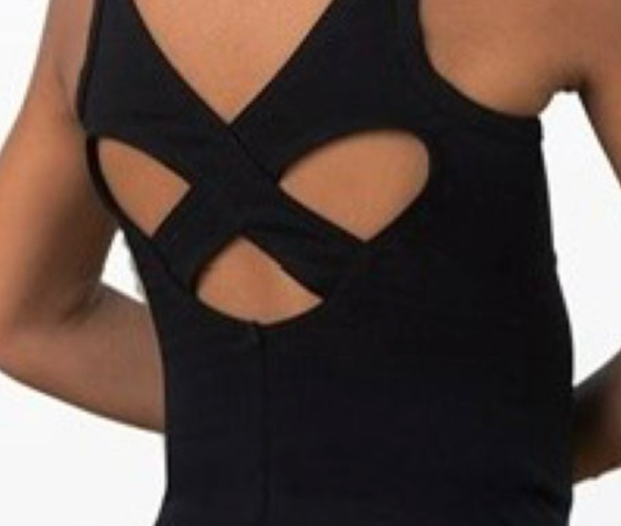 A black athletic top with a criss-cross back design featuring abstract curved cutouts revealing brown skin