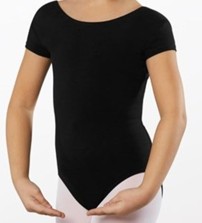Photograph of a young dancer wearing a black short-sleeve boat neck ballet leotard and light pink tights with hands in a graceful pose
