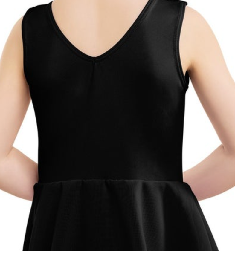 Photograph of the back of a person wearing a black sleeveless leotard with a deep V-neck and a subtly gathered peplum skirt detail