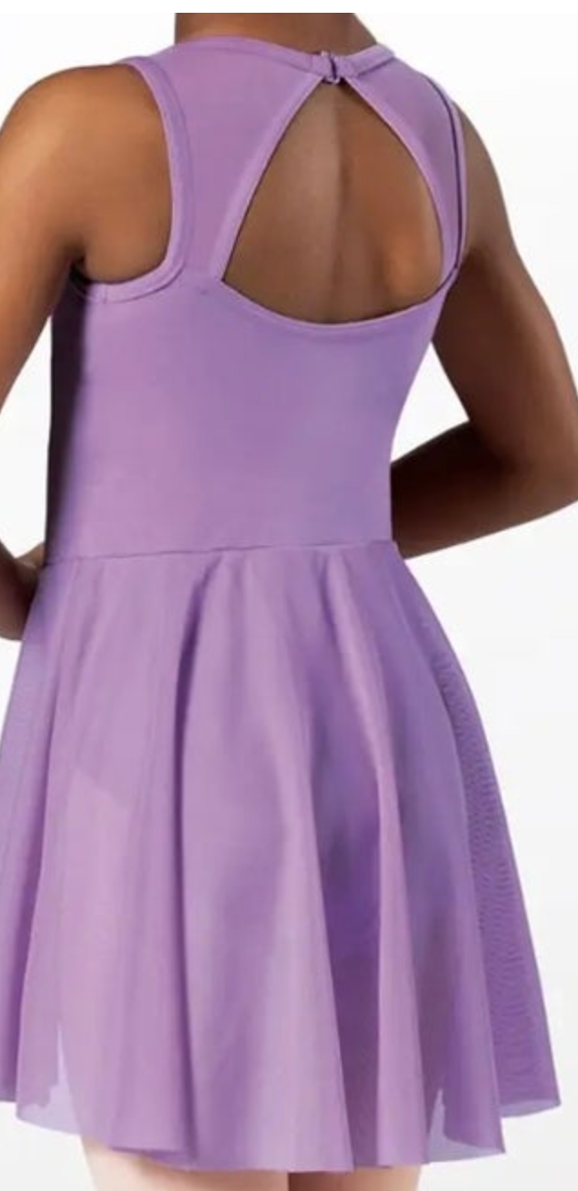 A dancer models a light purple sleeveless leotard with a keyhole back and a flowing mesh skirt overlay